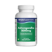 Flacone di integratore etichettato “Ashwagandha 5000mg Simply Supplements” con etichetta verde su sfondo bianco.