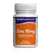 Flacone di integratore etichettato “Zinco 15mg Simply Supplements” con etichetta arancione su sfondo bianco.