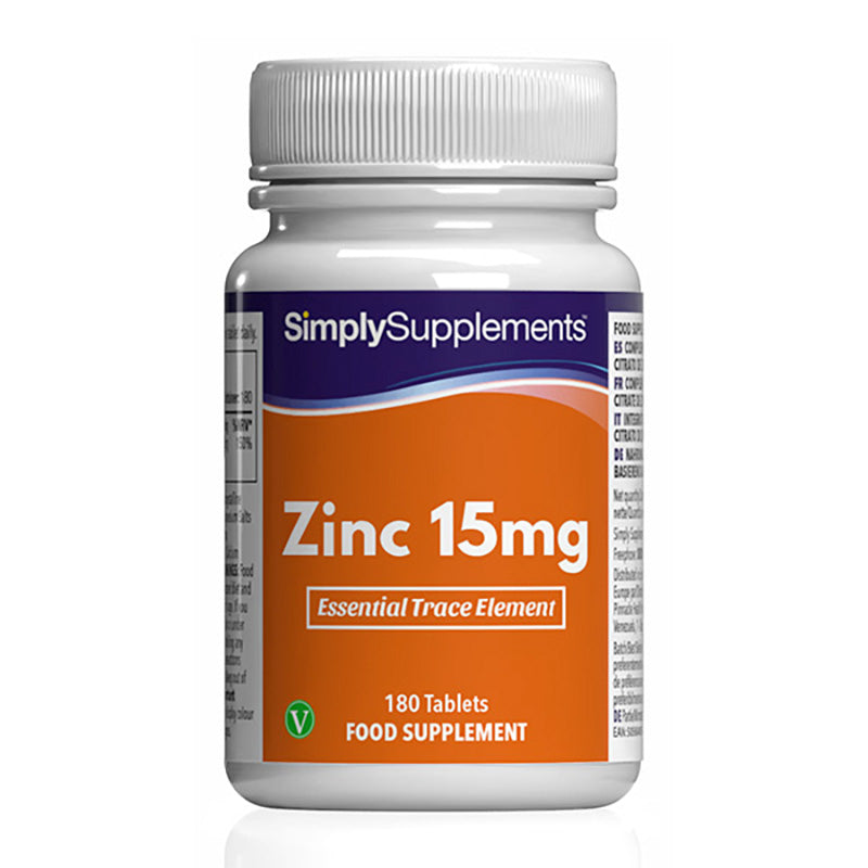 Flacone di integratore etichettato “Zinco 15mg Simply Supplements” con etichetta arancione su sfondo bianco.